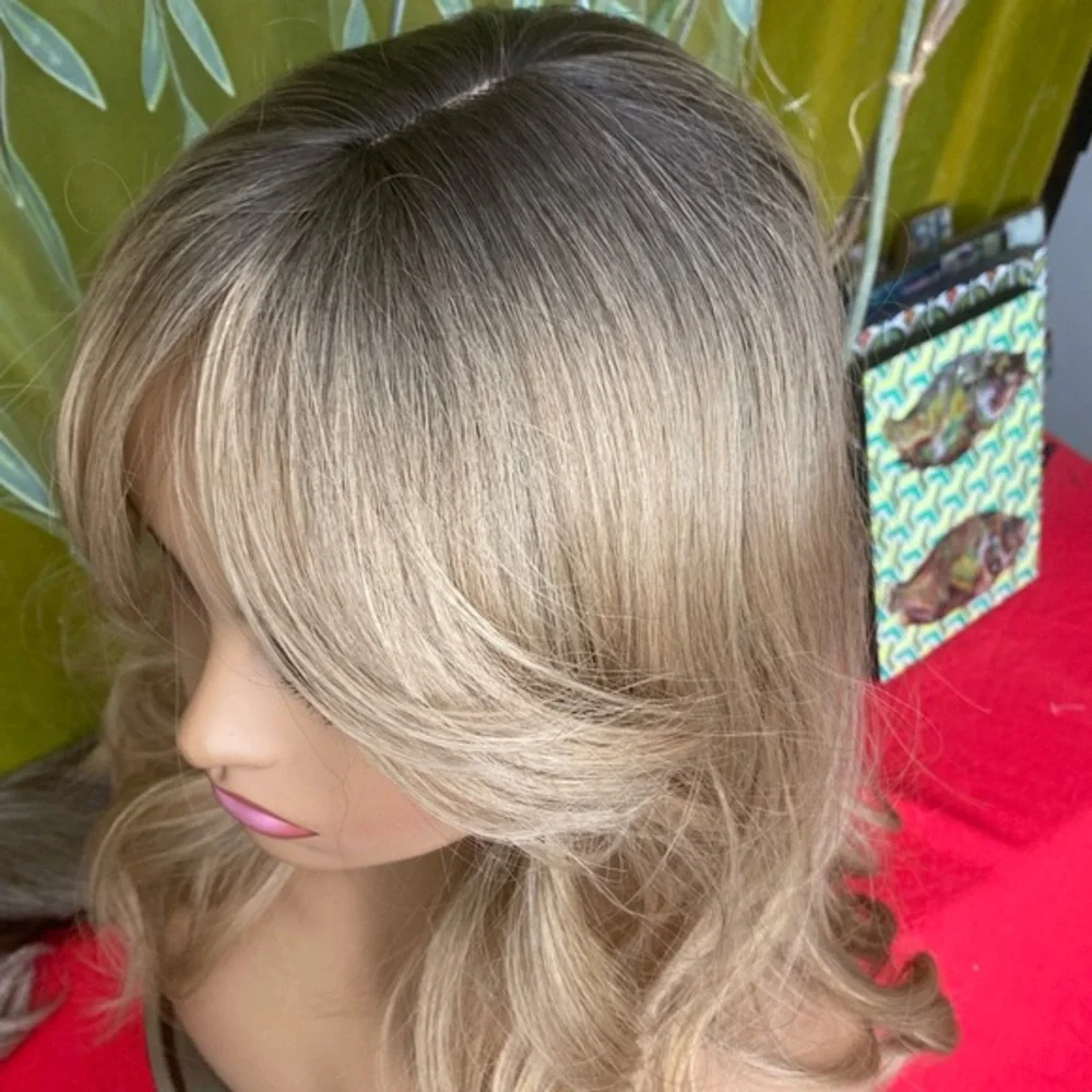 Light natural blonde layered wig with ash brunette roots